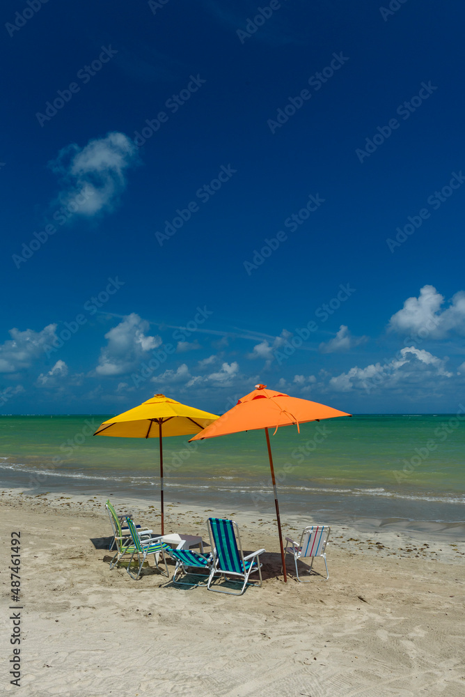 Beach. Sao Miguel dos Milagres, Alagoas, Brazil. Colorful umbrellas and chairs at Toque Beach on February 11, 2022.