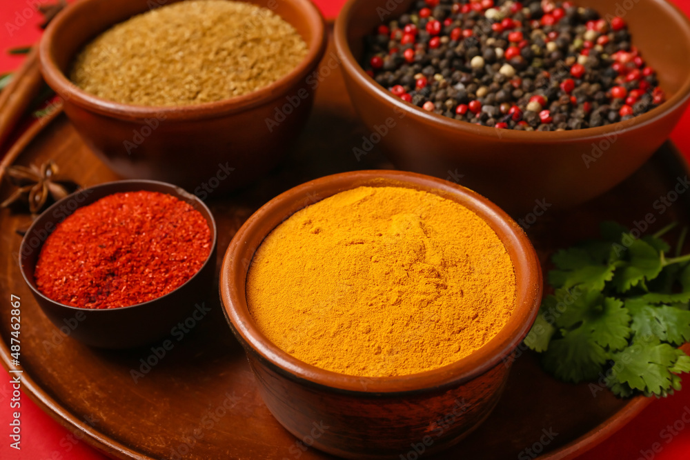 Tray with bowls of aromatic spices, closeup Tray with bowls of aromatic spices, closeup