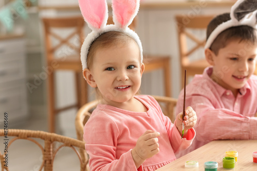 Cute little girl in bunny e...