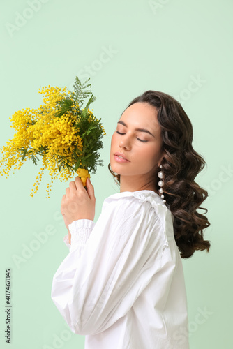 Beautiful young woman with ...