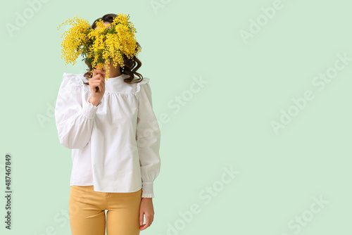 Beautiful young woman with ...