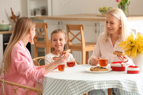 Young woman with her little...