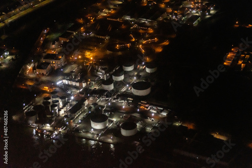 Fototapeta Naklejka Na Ścianę i Meble -  Night aerial view of fuel storage tanks