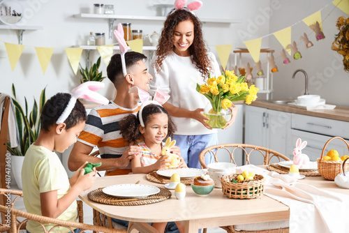 Happy family at dining tabl...