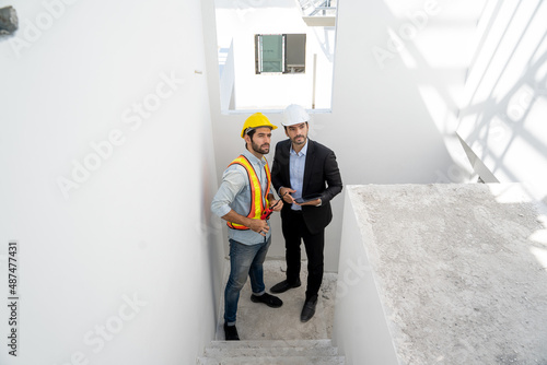 Contractor and engineer inspecting material a building site,New house builder,House improvement concept.
