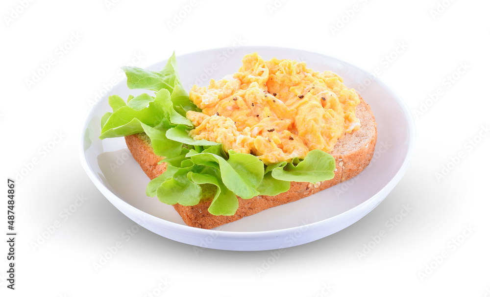 Sliced bread with scrambled eggs, black pepper isolated on white background. Sliced bread with scrambled eggs, black pepper isolated on white background.