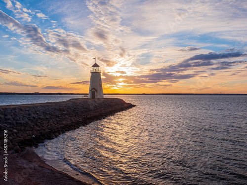 Sunset beautiful afterglow over the lighthouse of Lake Hefner
