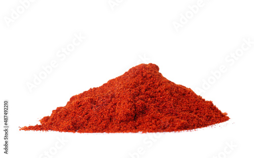 Foto Heap of aromatic paprika powder on white background