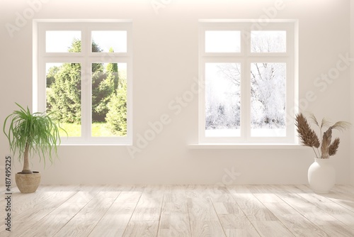 Mock up of empty room in white color with winter and summer landscape in window. Scandinavian interior design. 3D illustration
