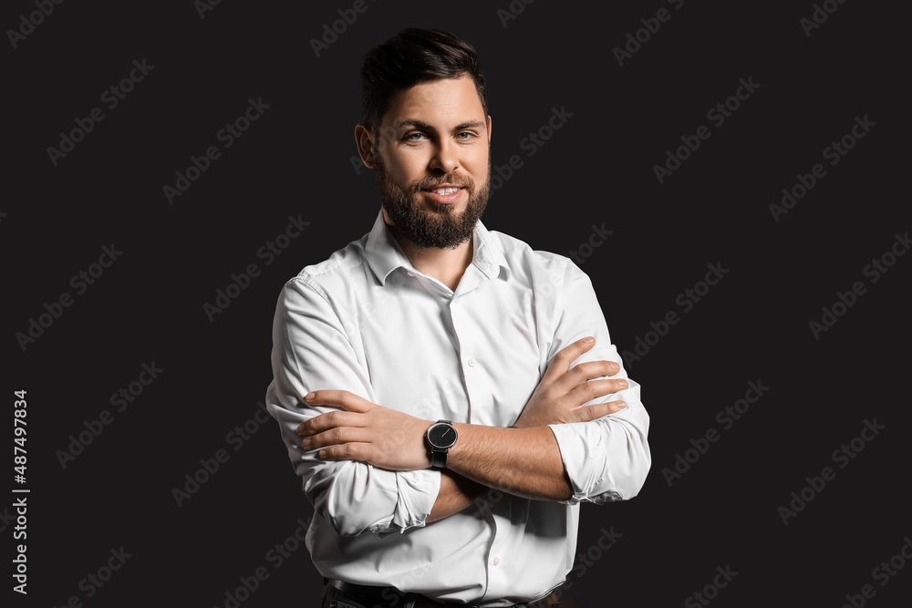 Stylish bearded man on dark background Stylish bearded man on dark background