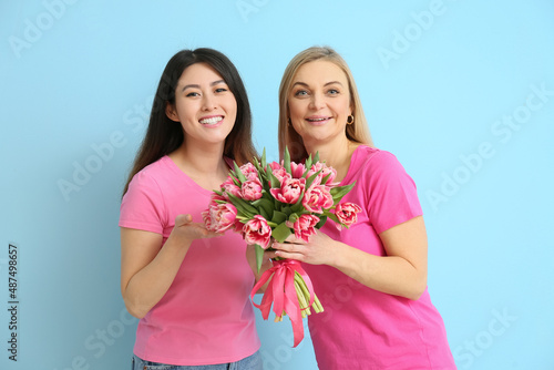 Beautiful women with flower...