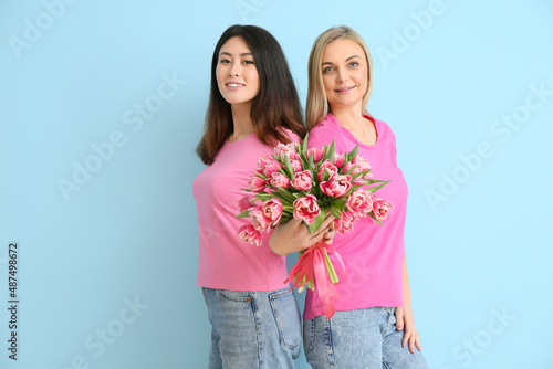 Beautiful women with flower...