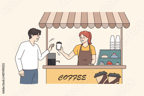 Smiling man buy takeaway coffee in street coffeeshop from female barista. Happy girl serve guy client make espresso or cappuccino in cafeteria. Small business concept. Vector illustration. 
