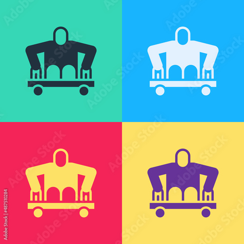 Pop art Man without legs sitting wheelchair icon isolated on color background. Disability concept. Guy with physical disabilities. Vector