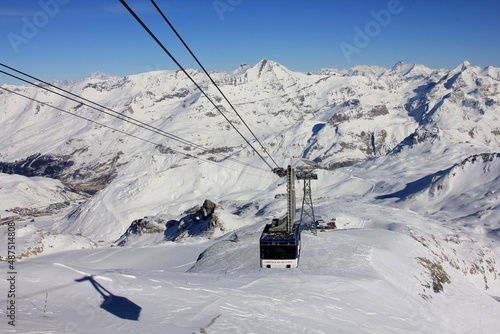 Shadow of the Cable Car on the Snow, Travelling Up to Le Grande Motte Ski Field, Tignes, France