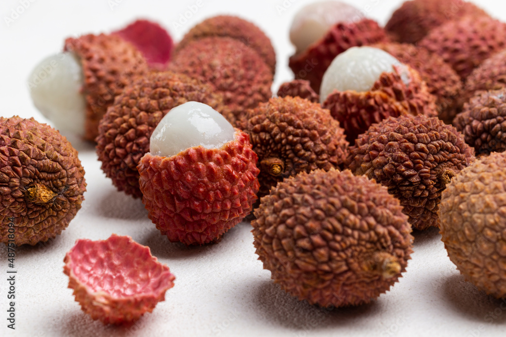 Bunch of lychee fruit on white. Close up. Bunch of lychee fruit on white. Close up.