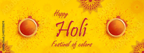 Happy Holi Festival, colorful gulal with powder color for the traditional Indian festival of colors with nice and creative design on color background