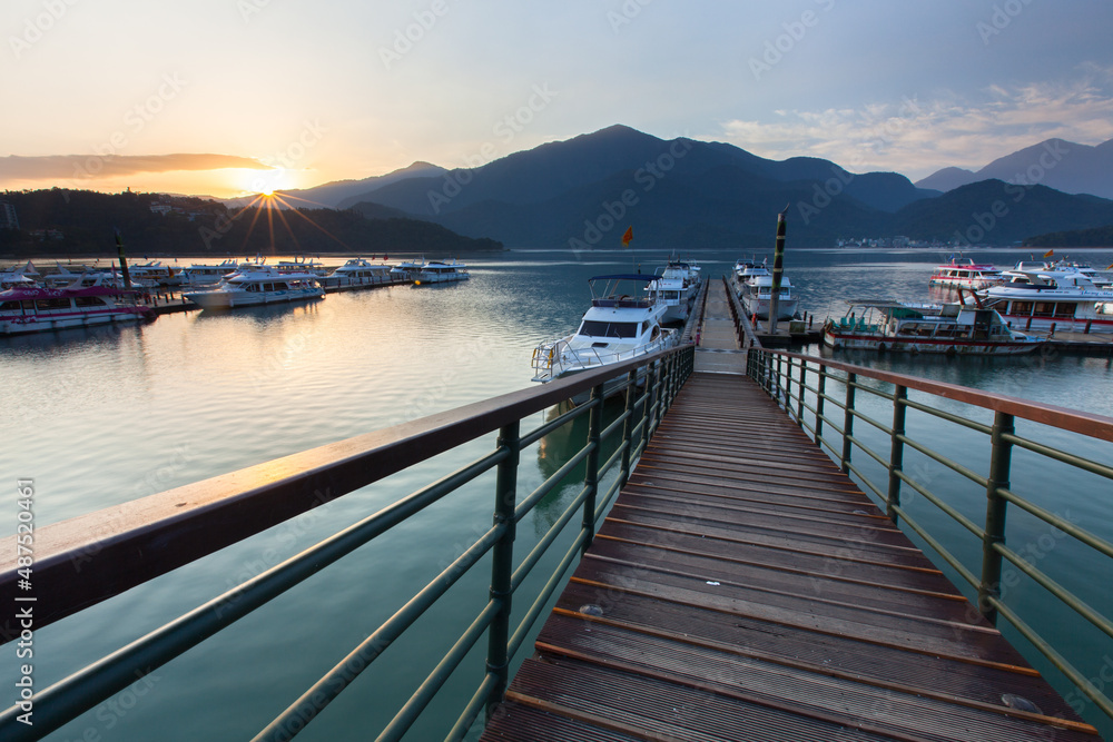 Obraz premium Asia culture - Beautiful landscape of lake level reflect fantasy dramatic sunrise sky in Sun Moon Lake , in Taiwan, Asia. the famous travel attractions in Nantou ,Taiwan. Scenery of Sun Moon Lake, 