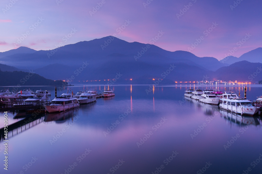 Obraz premium Asia culture - Beautiful landscape of lake level reflect fantasy dramatic sunrise sky in Sun Moon Lake , in Taiwan, Asia. the famous travel attractions in Nantou ,Taiwan. Scenery of Sun Moon Lake, 