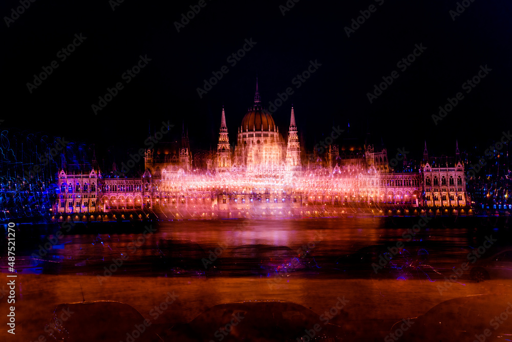 A magical view of the ancient city. A beautiful old building with illumination on the banks of the danube. Hungarian parliament building at night, budapest, hungary