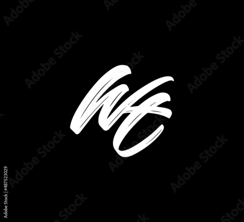 White Vector Letters Logo Brush Handlettering Calligraphy Style In Black Background Initial wt photo