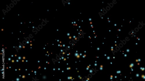 Colourful particles floating in space. Small bubbles rise as if floating. photo