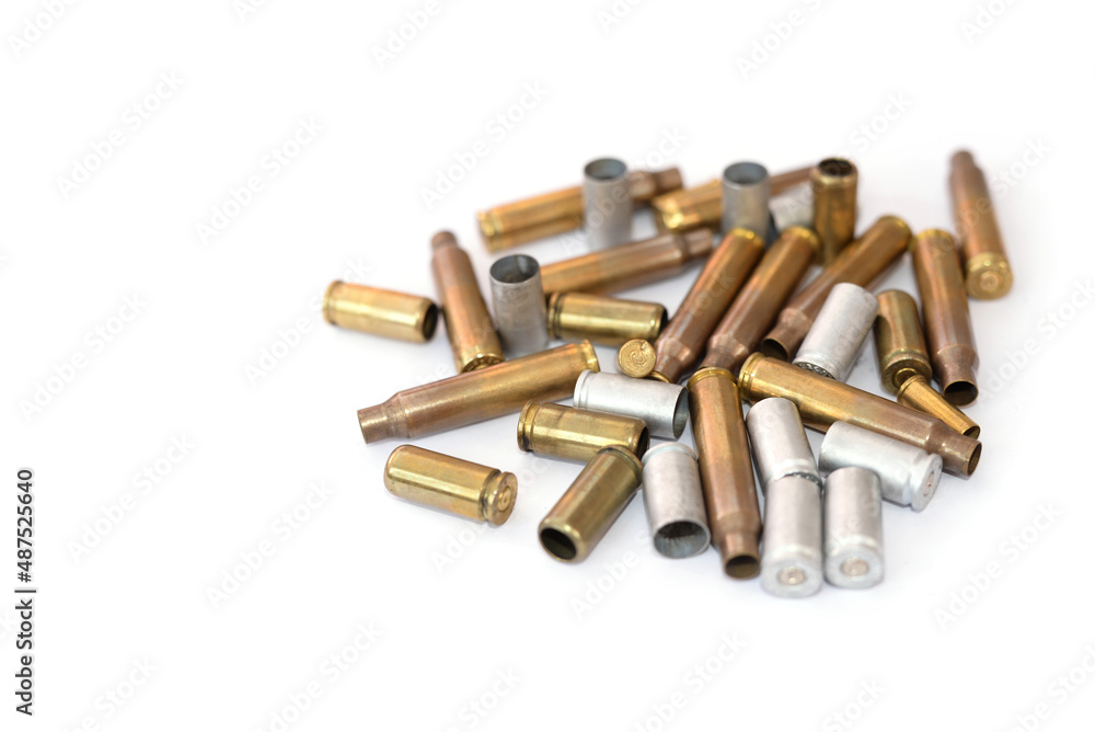 empty cartridge cases for shooting on a white empty cartridge cases for shooting on a white