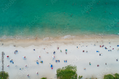 Aerial view top down of Coconut palm trees on the beautiful patong beach Phuket Thailand Amazing sea beach sand tourist travel destination in the andaman sea Beautiful island on February 12-2022