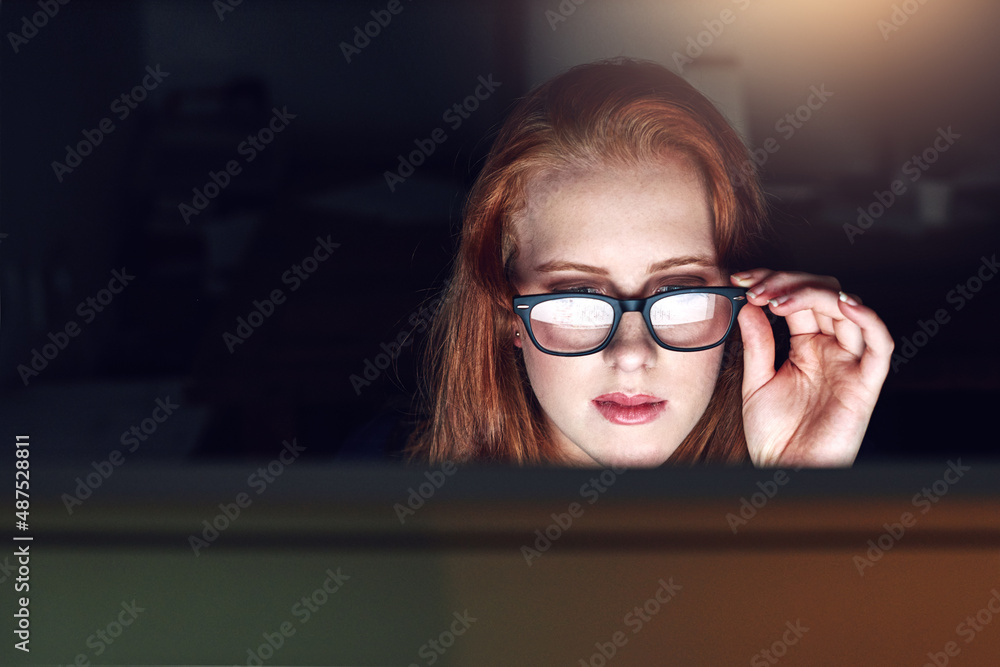 This could be the answer Ive been looking for. Shot of a young businesswoman working late in her office. This could be the answer Ive been looking for. Shot of a young businesswoman working late in her office.