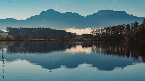 Beautiful autumn or indian summer view with reflections at the famous Abtsee lake, Saaldorf, Bavaria, Germany