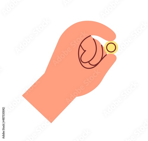 Fingers squeezing gold dollar coin. Hand holding cash money, change. Human wi...