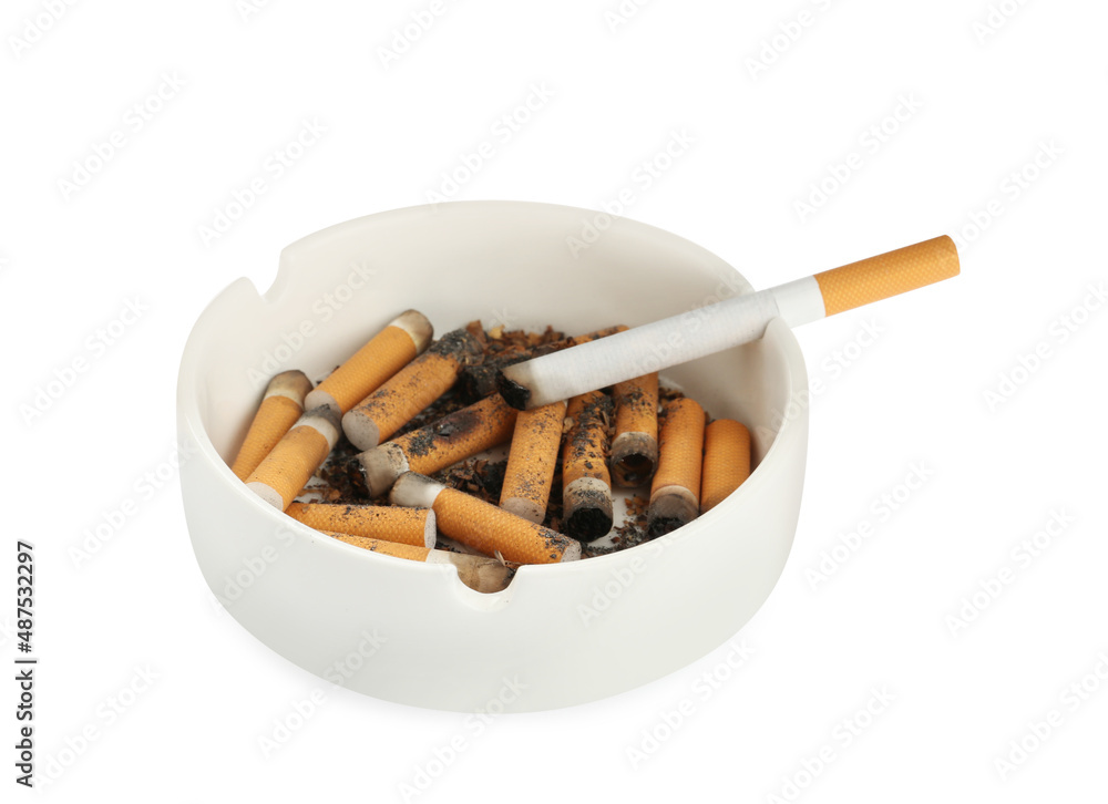 Ceramic ashtray with cigarette stubs isolated on white Ceramic ashtray with cigarette stubs isolated on white