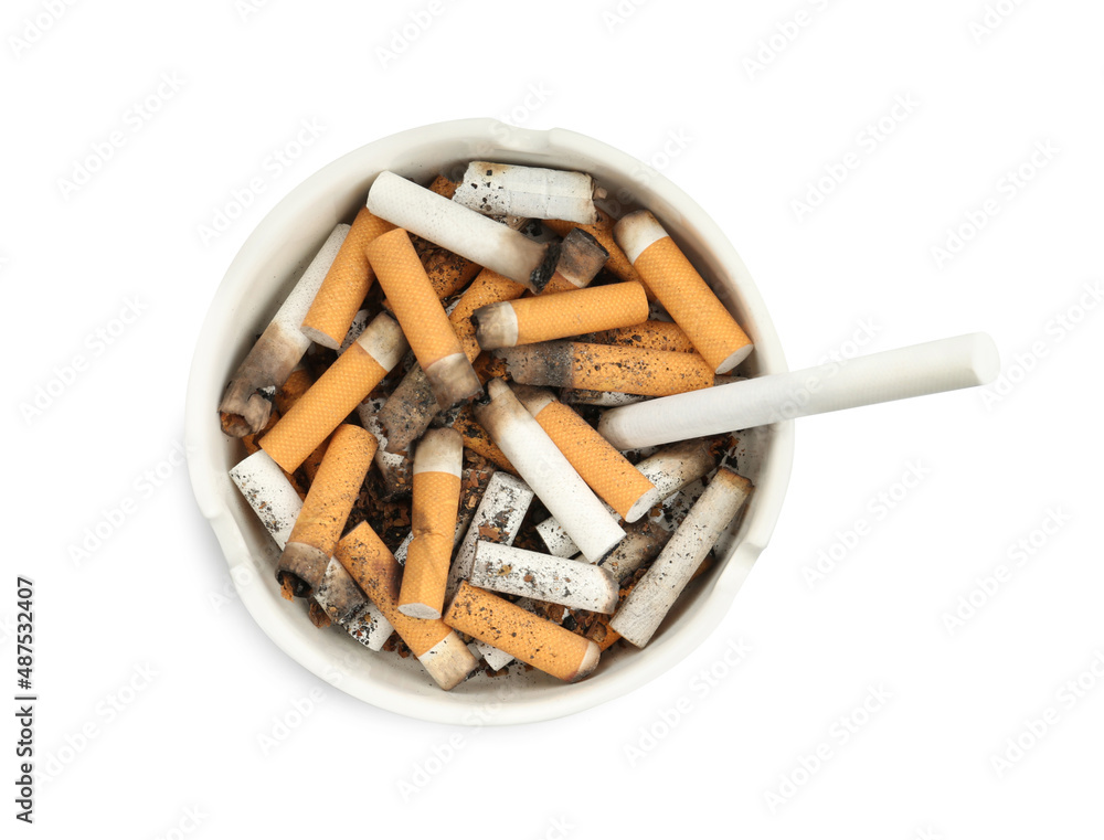 Ceramic ashtray full of cigarette stubs isolated on white, top view