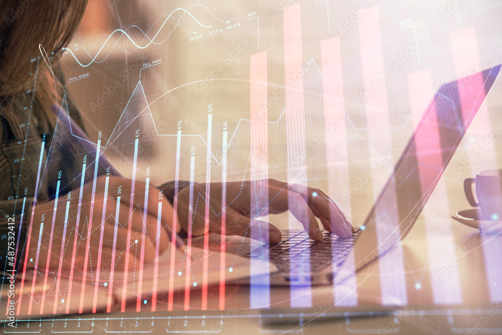 Double exposure of businesswoman hands typing on computer and forex graph hologram drawing. Financial analysis concept. Double exposure of businesswoman hands typing on computer and forex graph hologram drawing. Financial analysis concept.