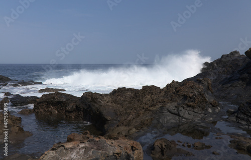 Gran Canaria, north coast, rockpools around Puertillo de Banaderos area protected from the ocean waves by volcanic rock barrier