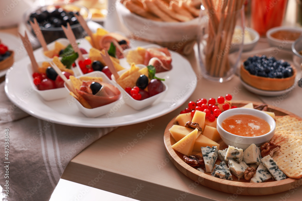 Dishes with different food on table. Luxury brunch Dishes with different food on table. Luxury brunch