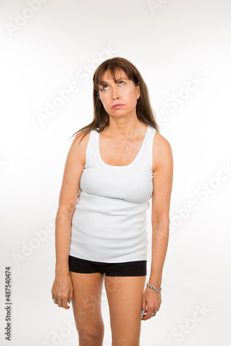 portrait adult caucasian woman expressing boredom on white background © luisrojasstock