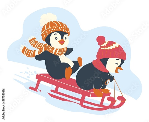 Funny penguins sledding. Christmas penguins ride on a sleigh
