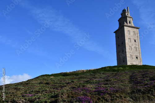 lighthouse in mountains, photo as a background , in a coruna north spain, galicia, spain, europe , tower of hercules lighthouse