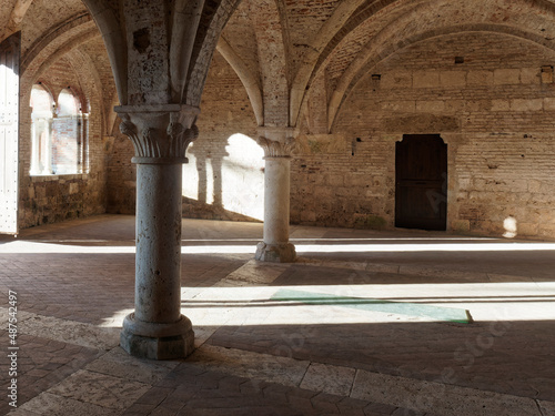 San Galgano, Chiusdino (SI), Italy - February 12, 2022: Ruins of the former Cistercian abbey Abbazia San Galgano, Chiusdino, Siena, Tuscany, Italy photo
