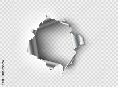 ragged Hole torn in ripped metal on transparent background photo