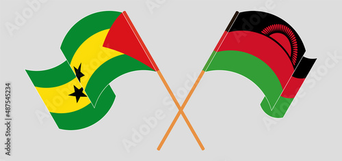 Crossed and waving flags of Sao Tome and Principe and Malawi