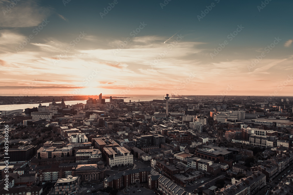 sunset over the city Liverpool with river Mersey view