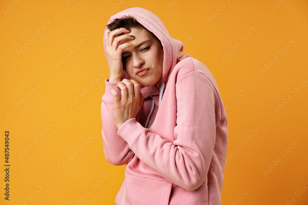 Young short-haired woman with weird expression iin studio Young short-haired woman with weird expression iin studio