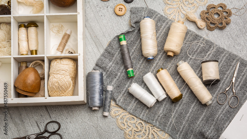 Sewing supplies on a wood table