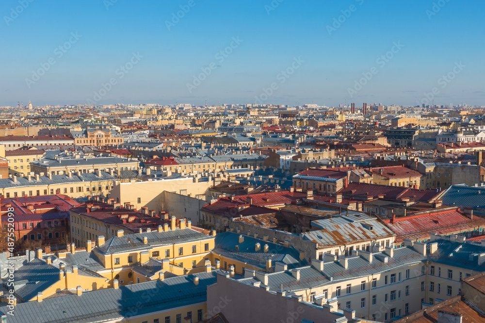Cityscape aerial view of the rooftops in the central area of the city of St. Petersburg, deck houses, residential buildings.