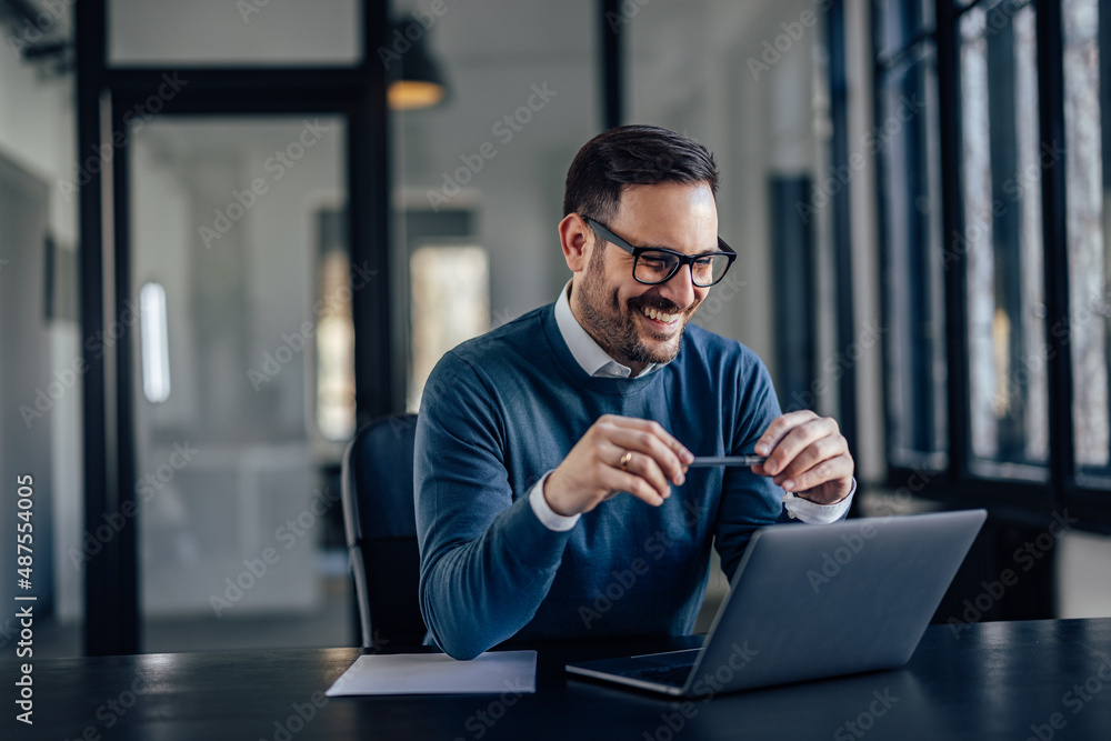 Lovely caucasian office worker, playing with his plan, while coming up with ideas. Lovely caucasian office worker, playing with his plan, while coming up with ideas.