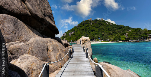 Panoramic view with Stairway with blue sky  to Heaven at Diamond beach in Nusa penida island, Bali in Indonesia. photo