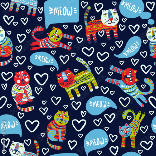 Cute and trendy vector seamless pattern with decorative drawn cats and "Meow" text. talking funny pets in a template for print and design of children's products.