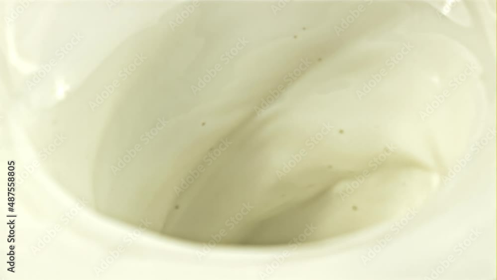 A whirlpool of milk. Macro background. Filmed on a high-speed camera at 1000 fps. High quality FullHD footage A whirlpool of milk. Macro background. Filmed on a high-speed camera at 1000 fps. High quality FullHD footage